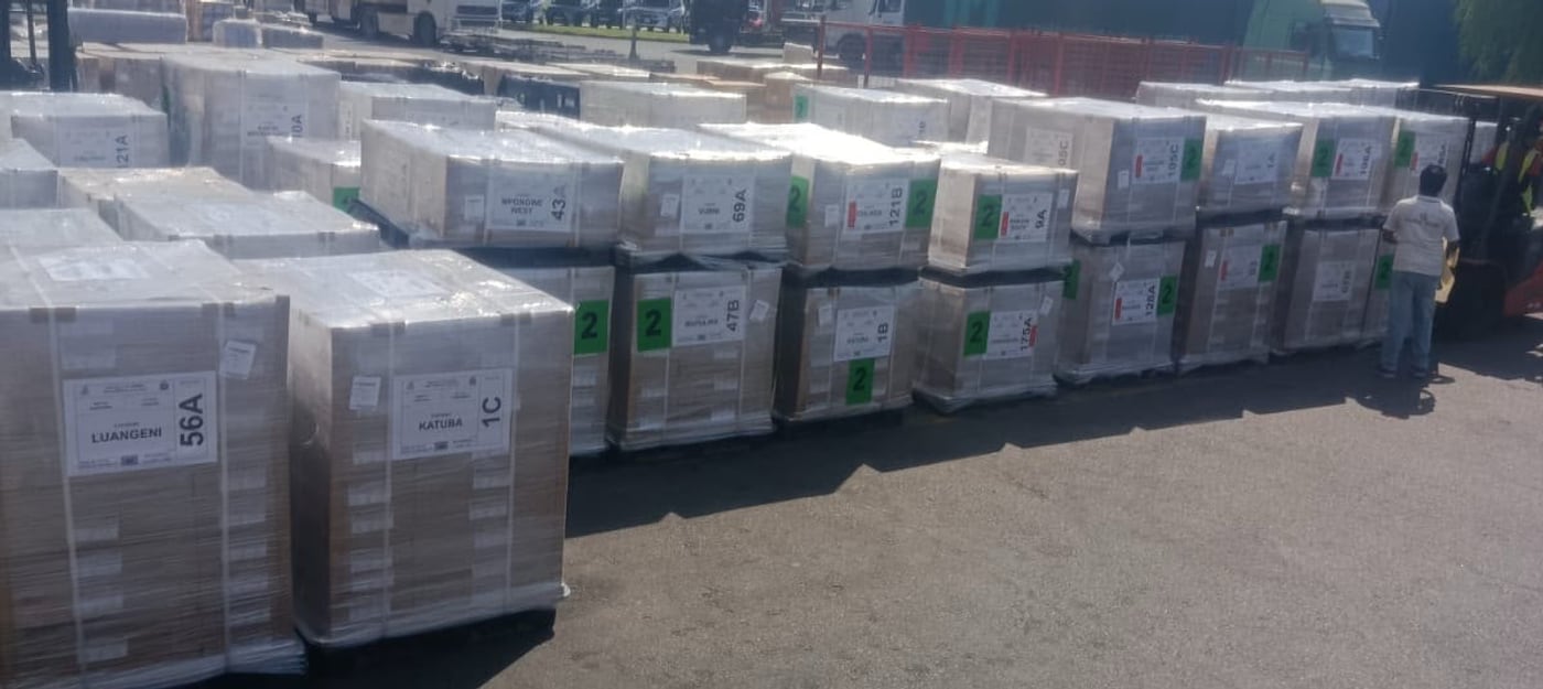 Palletised election material built up on the apron in Dubai